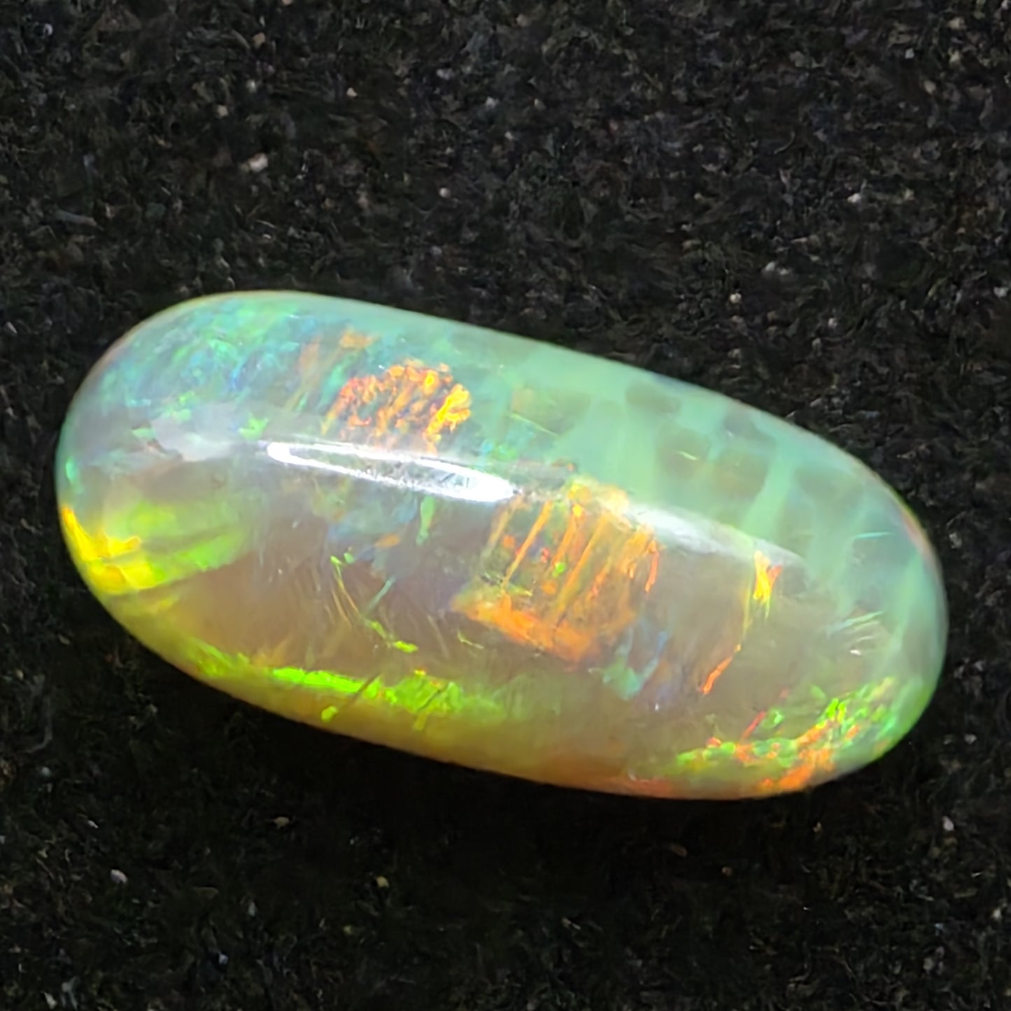 Black Opal special Ethiopian Welo, 4.45 ct oval polished, natural, intense Play-of-Colour