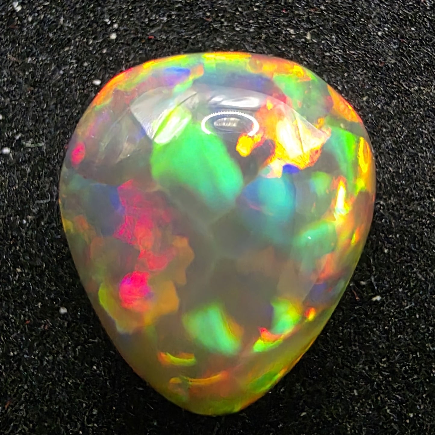 Black Opal special Ethiopian Welo, 5.6 ct pear polished, natural, intense Play-of-Colour