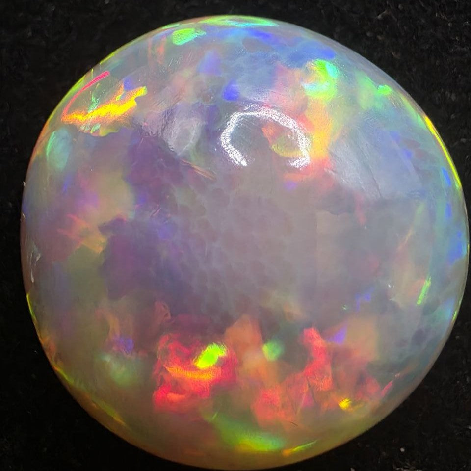 Black Opal special Ethiopian Welo, 19 ct freeform polished, natural