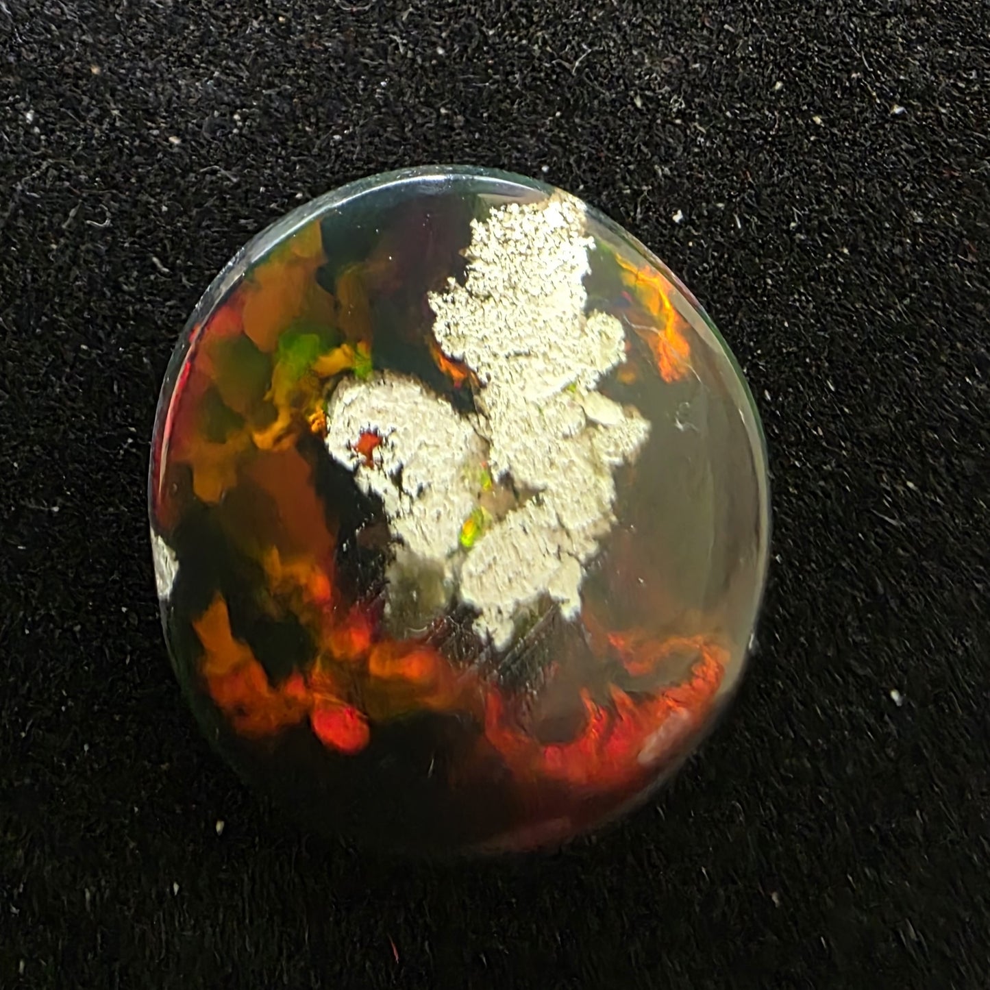 Black Opal special Ethiopian Welo, 7.5 ct pear polished, natural