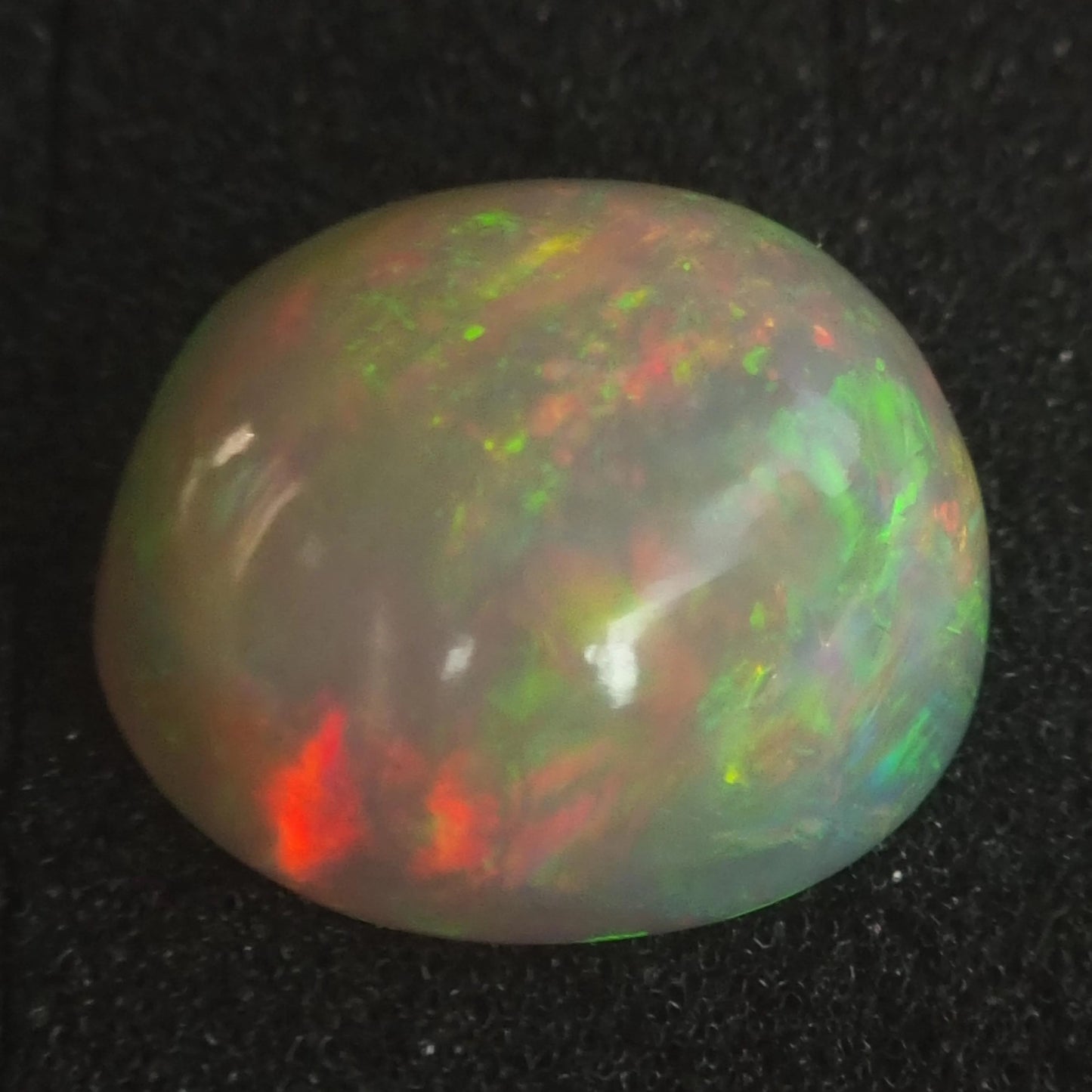 Artsy Black Opal special Ethiopian Welo, 34.2 ct freeform polished, natural