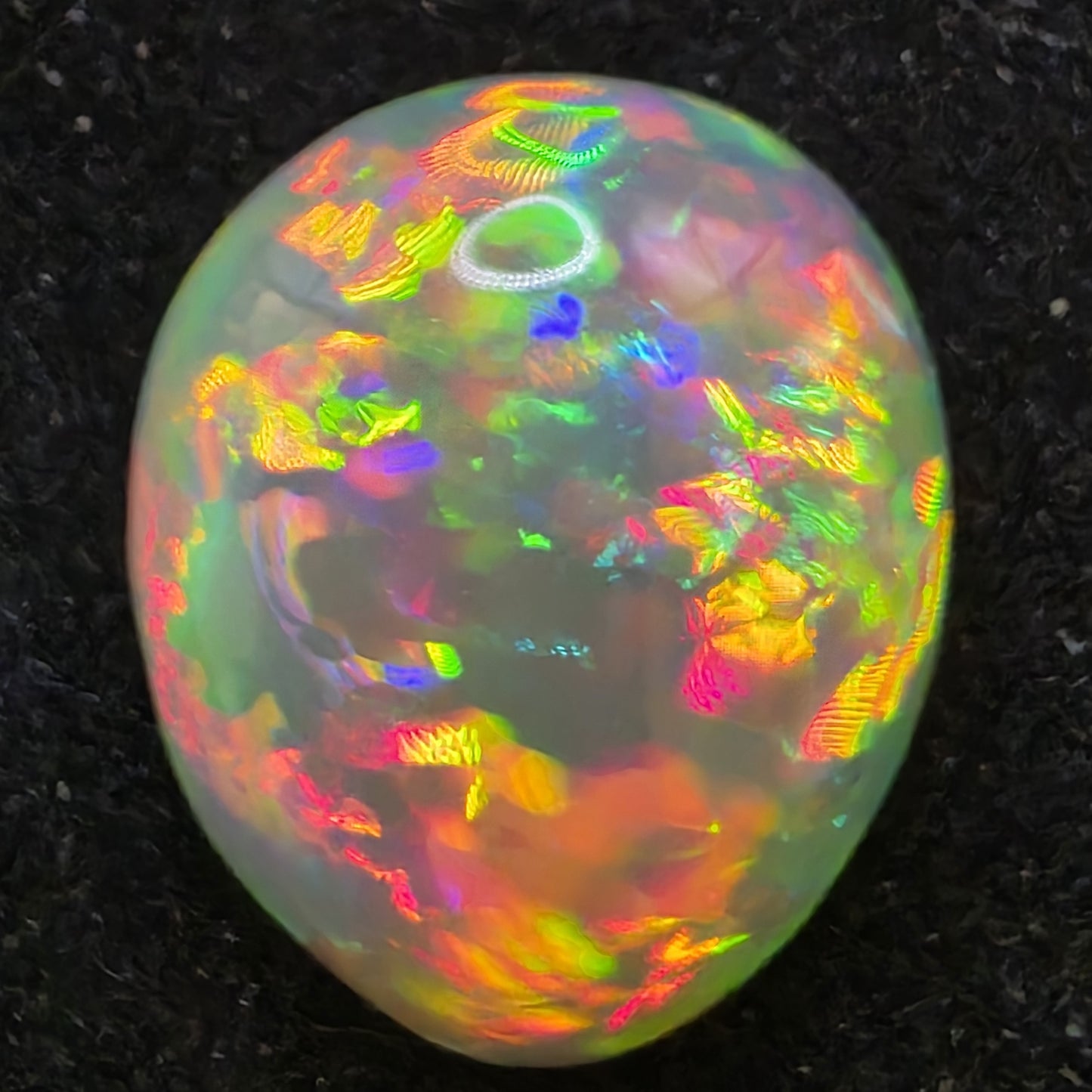 Honeycomb Black Opal special Ethiopian Welo, 5 ct pear polished, natural, intense Play-of-Colour
