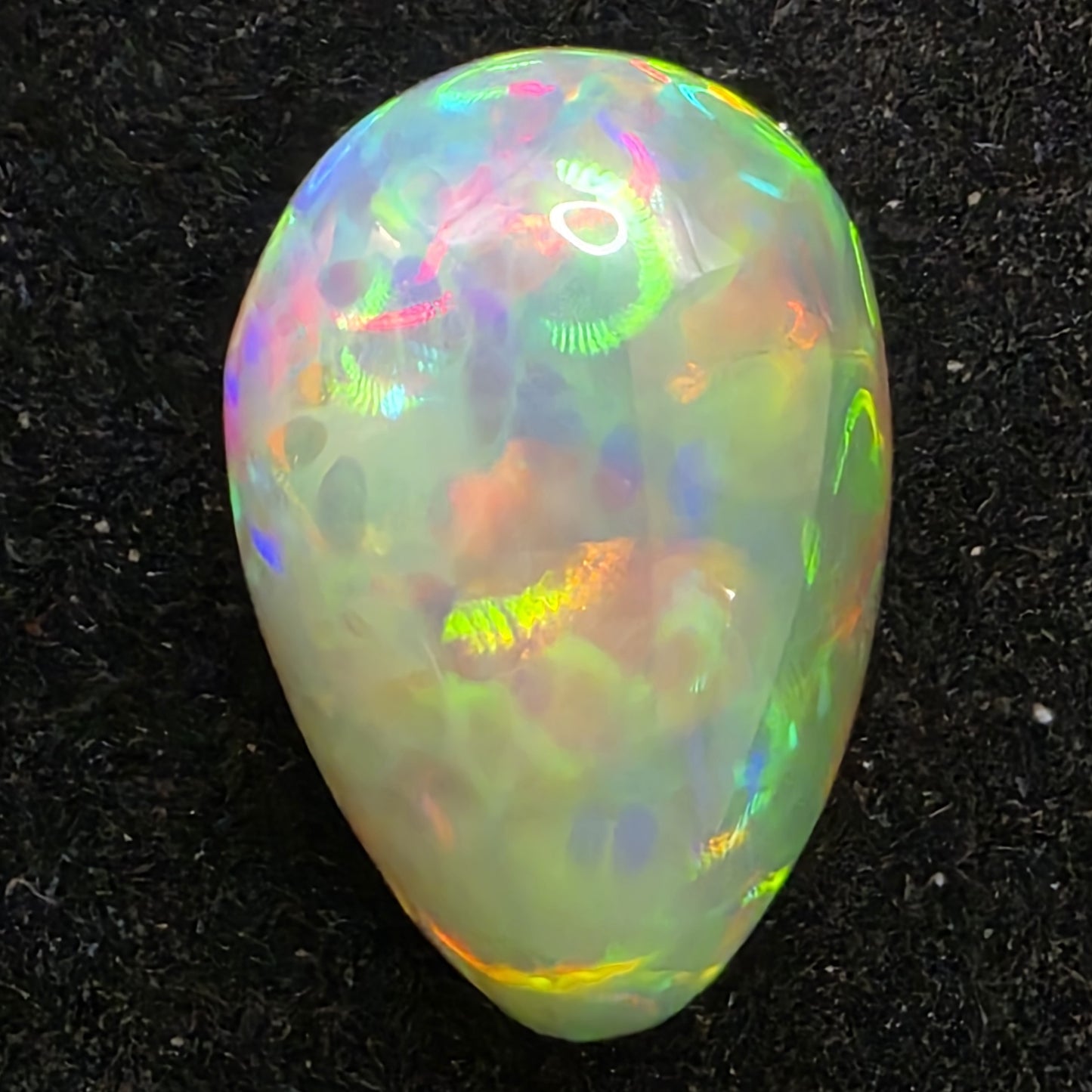 Black Opal special Ethiopian Welo, 4.55 ct pear polished, natural, intense Play-of-Colour