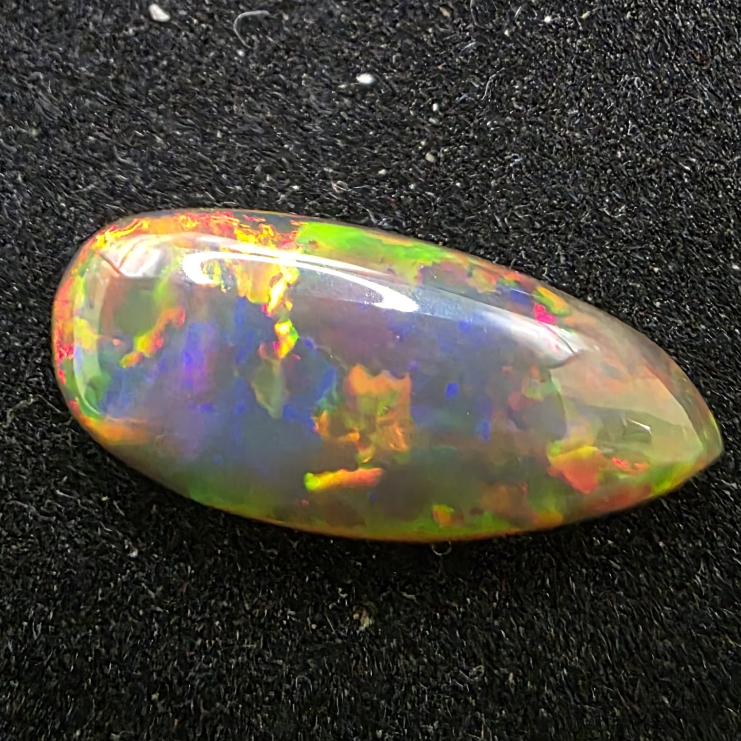 Black Opal special Ethiopian Welo, 2.55 ct pear polished, natural, intense Play-of-Colour