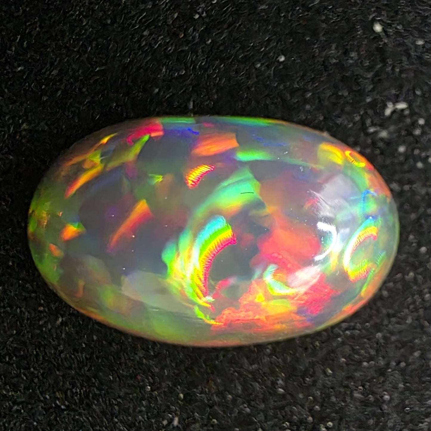 Black Opal special Ethiopian Welo, 2.95 ct oval polished, natural, intense Play-of-Colour