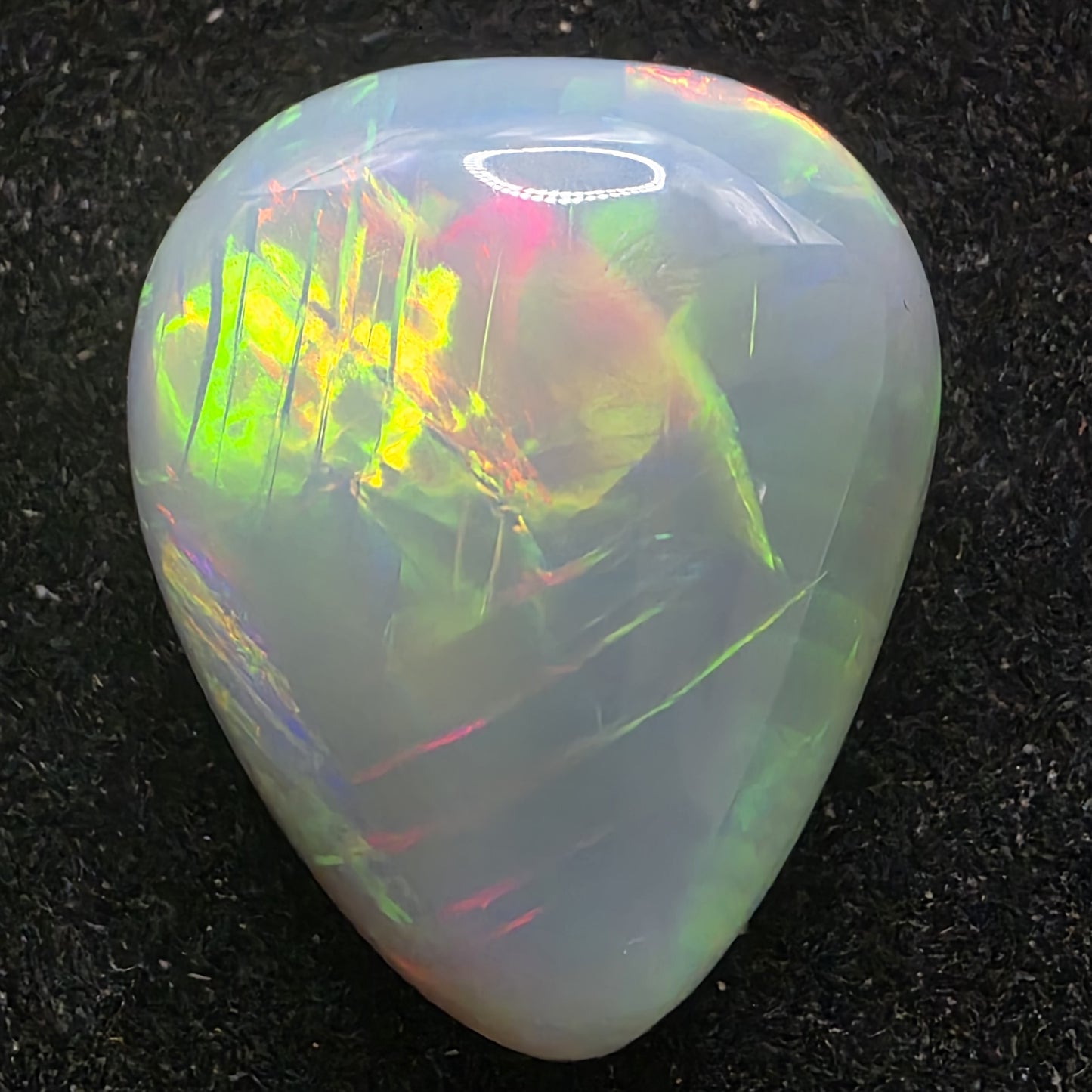 Artsy Black Opal special Ethiopian Welo, 13.85 ct pear polished, natural, intense Play-of-Colour