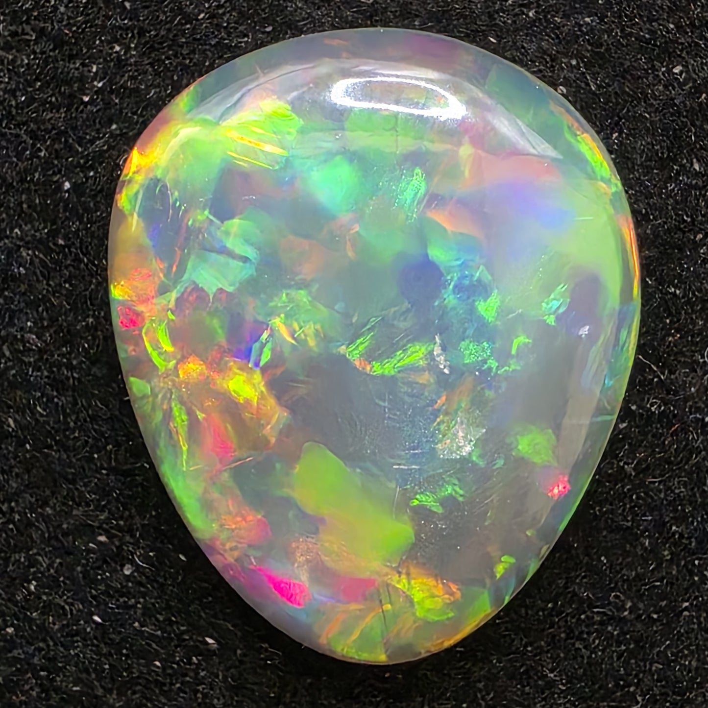 Black Opal special Ethiopian Welo, 6.6 ct pear polished, natural, intense Play-of-Colour