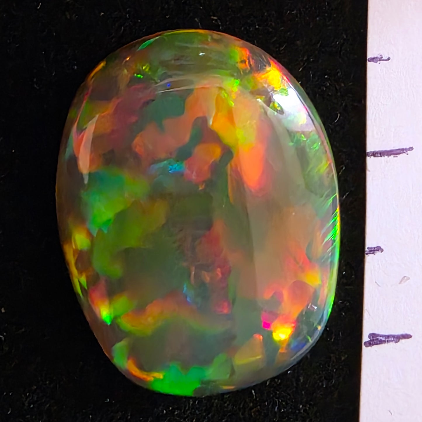 Perfect! Black Opal outstanding Ethiopian Welo, 7.3 ct freeform polished, natural, intense Play-of-Colour