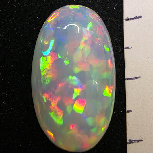 White Opal special Ethiopian Welo, 13.05 ct oval polished, natural, intense Play-of-Colour