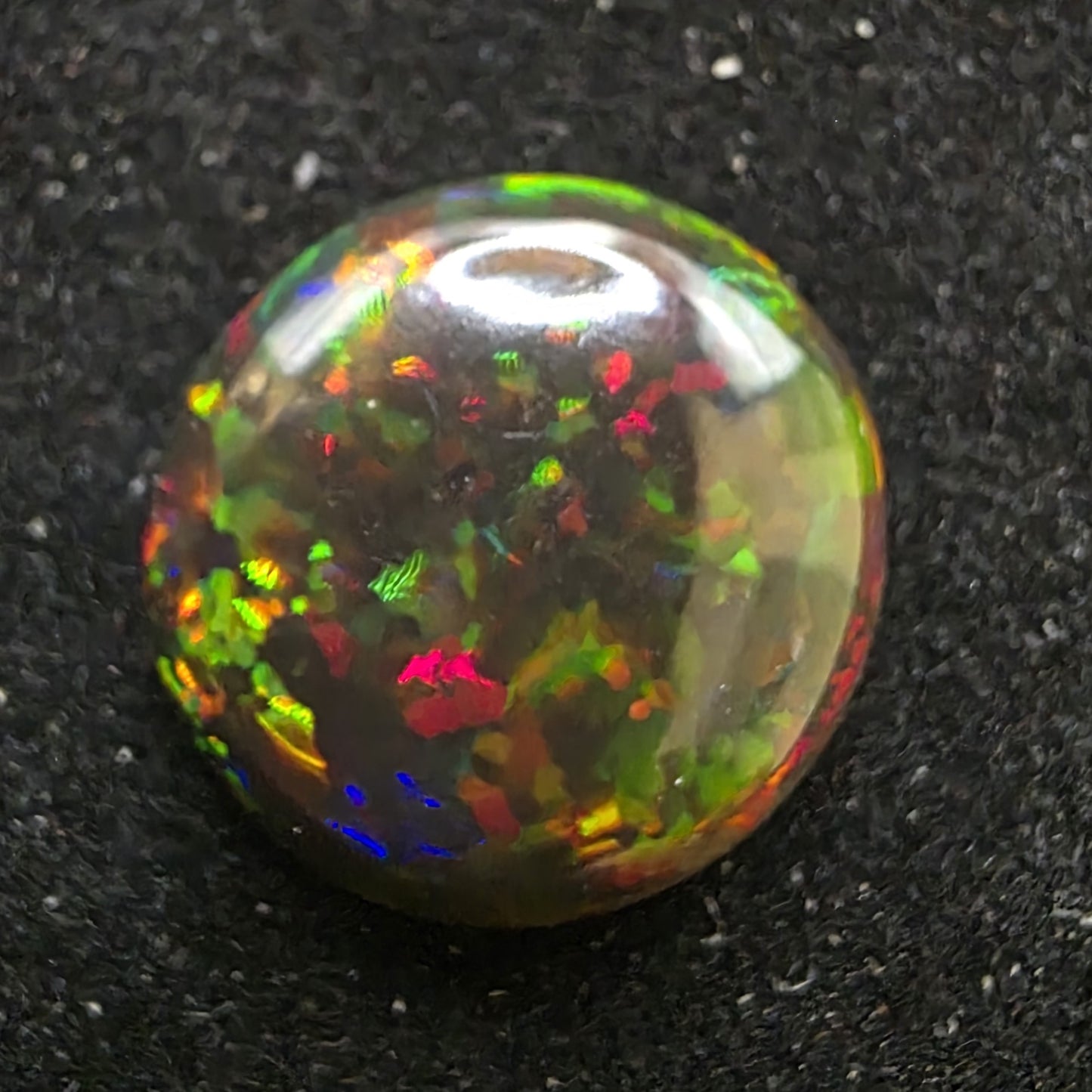 Black Opal special Ethiopian Welo, 6.05 ct oval polished, natural, intense Play-of-Colour