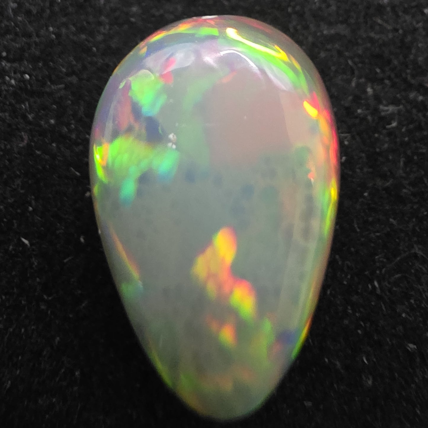 Black Opal special Ethiopian Welo, 4.1 ct pear polished, natural, intense Play-of-Colour