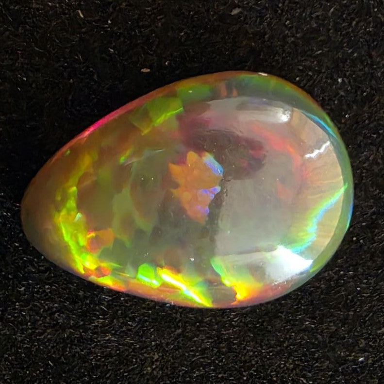 Perfect! Black Opal outstanding Ethiopian Welo, 6.45 ct pear polished, natural, intense Play-of-Colour