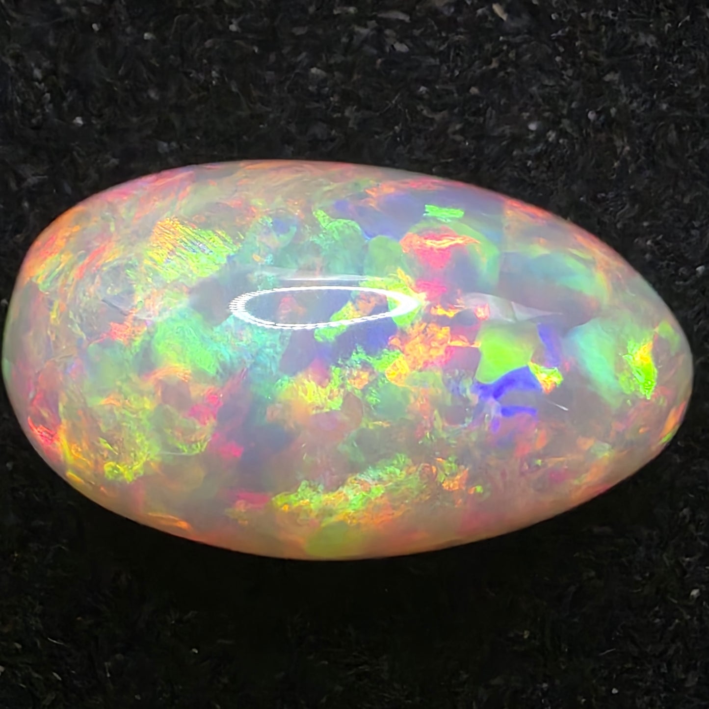 White Opal special Ethiopian Welo, 21 ct oval polished, natural, intense Play-of-Colour