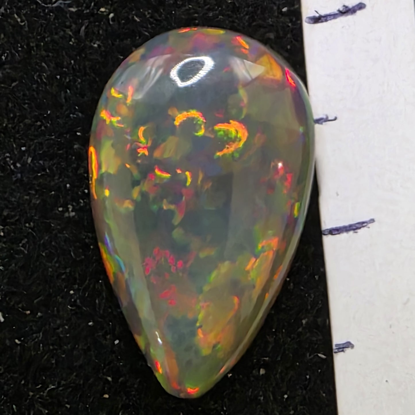 Black Opal special Ethiopian Welo, 3.45 ct pear polished, natural, intense Play-of-Colour