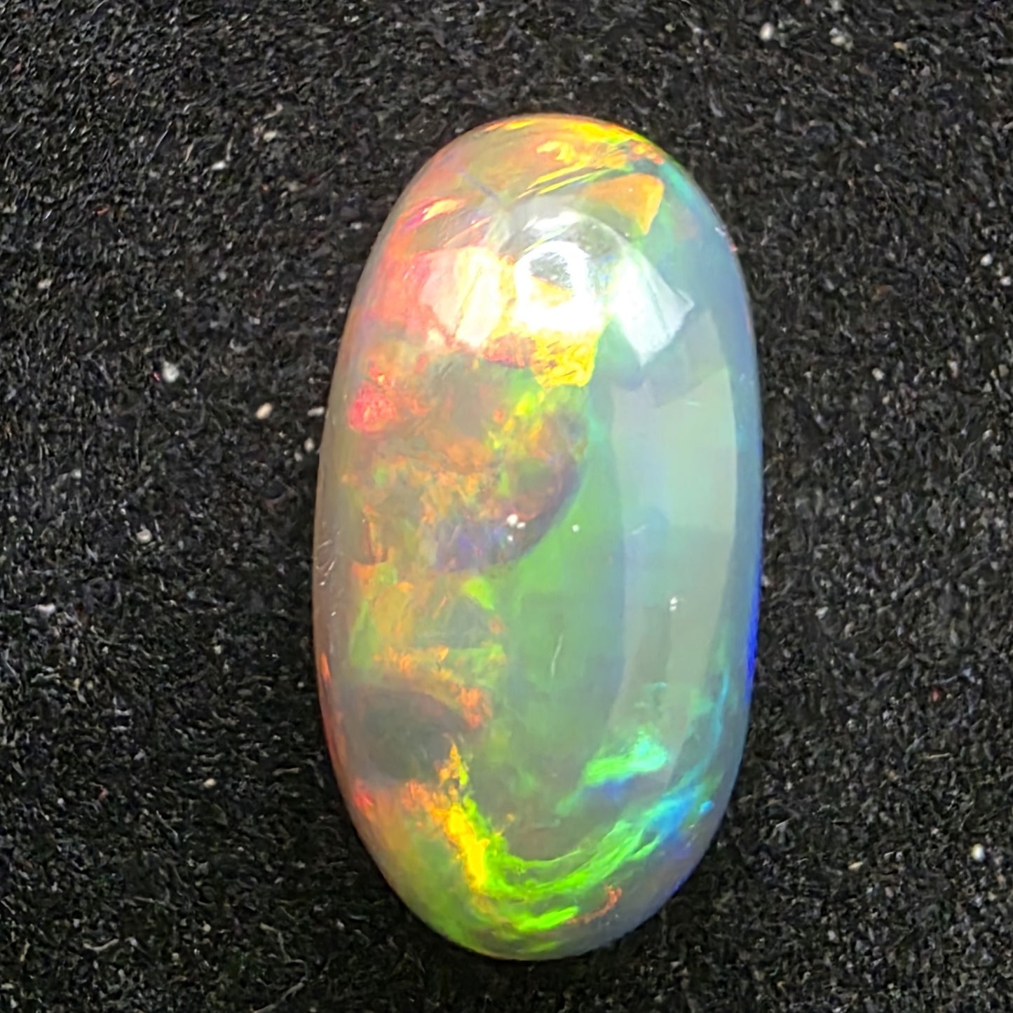 Black Opal special Ethiopian Welo, 5.4 ct oval polished, natural, intense Play-of-Colour