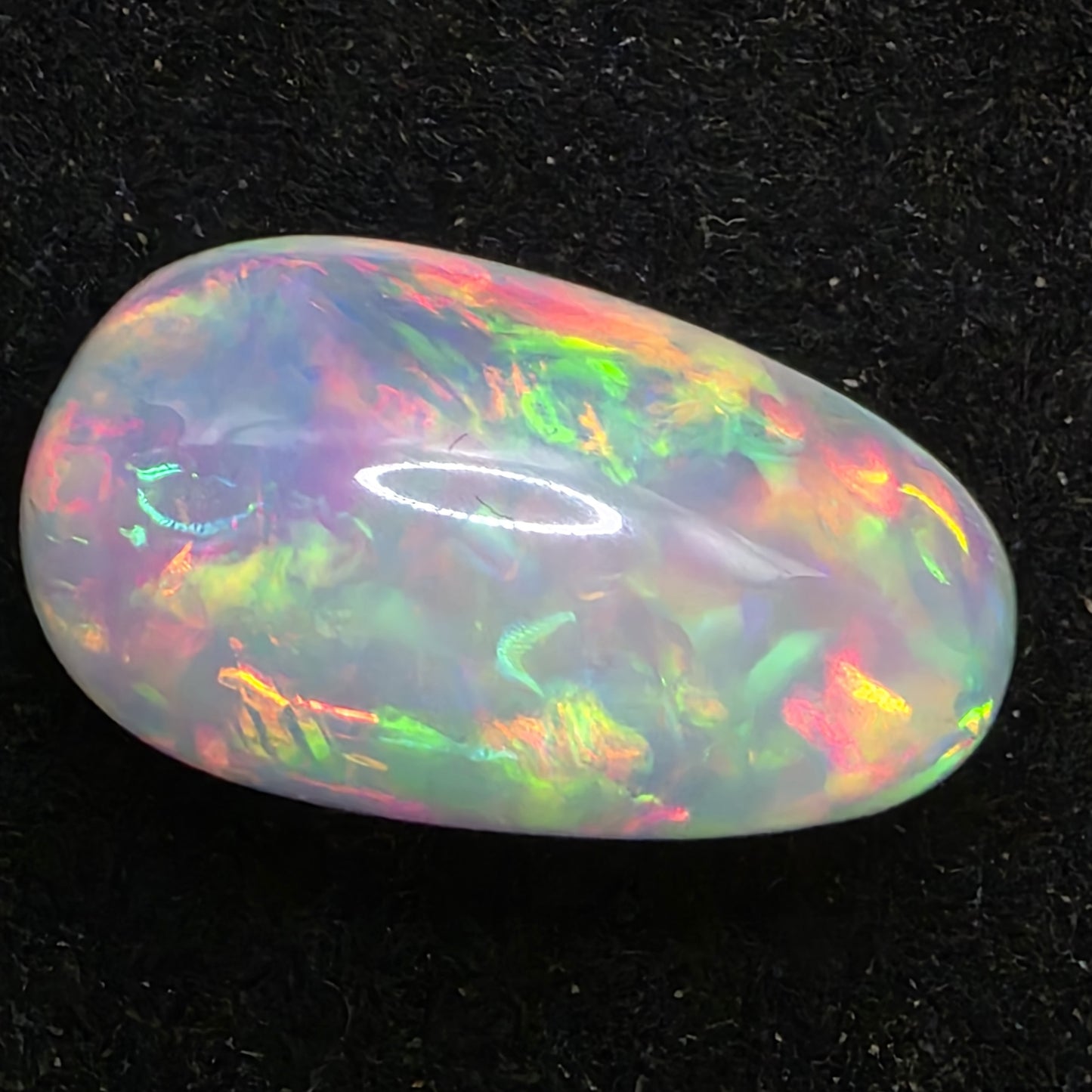 White Opal special Ethiopian Welo, 10.75 ct pear polished, natural, intense Play-of-Colour