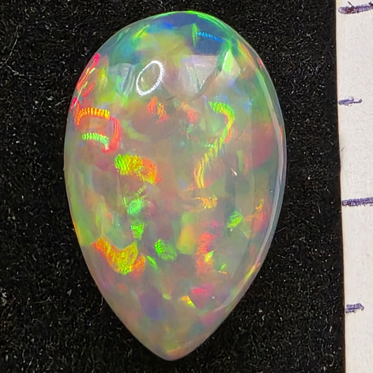 Black Opal special Ethiopian Welo, 6.1 ct pear polished, natural, intense Play-of-Colour