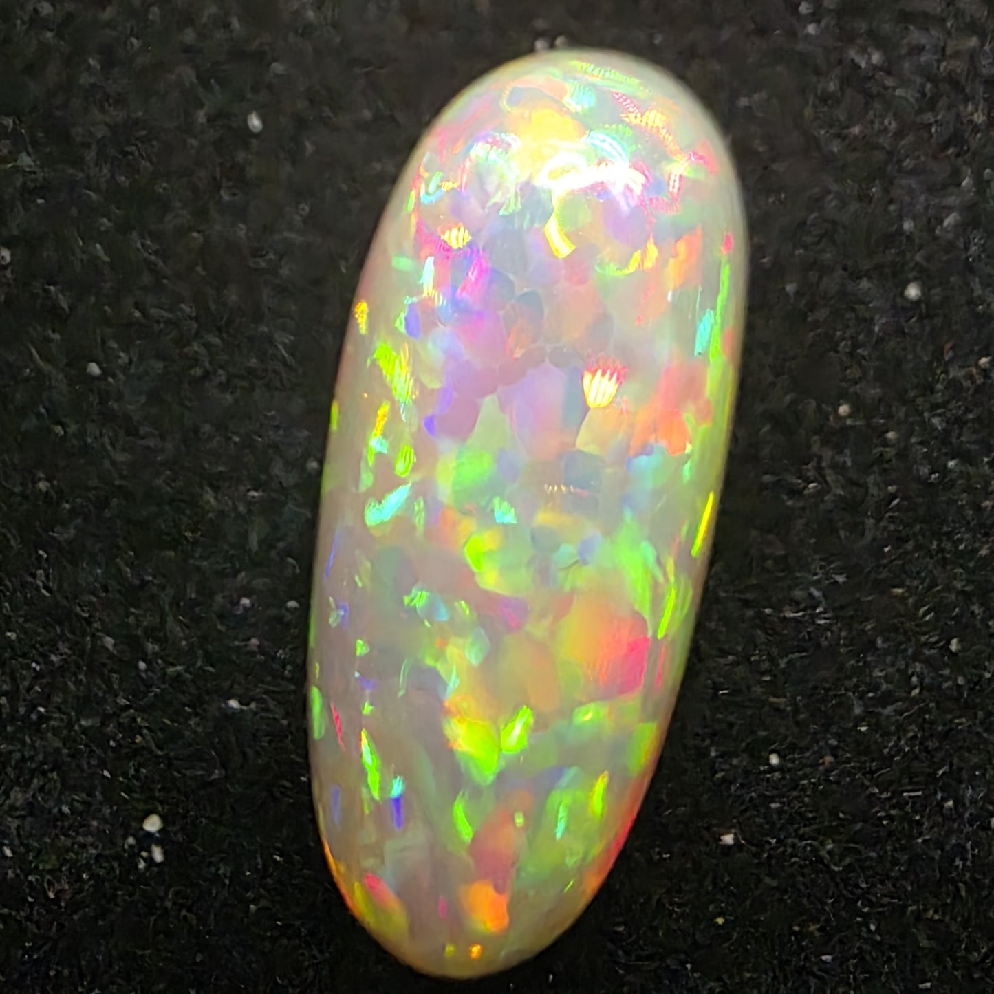 Black Opal special Ethiopian Welo, 6.85 ct oval polished, natural, intense Play-of-Colour