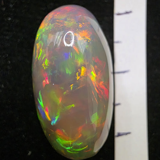 Black Opal special Ethiopian Welo, 16.8 ct oval polished, natural, intense Play-of-Colour