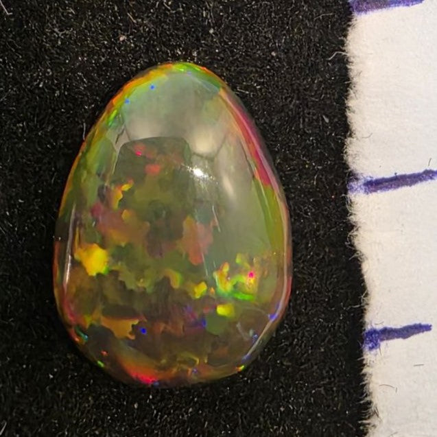 Black Opal special Ethiopian Welo, 2.75 ct pear polished, natural, intense Play-of-Colour