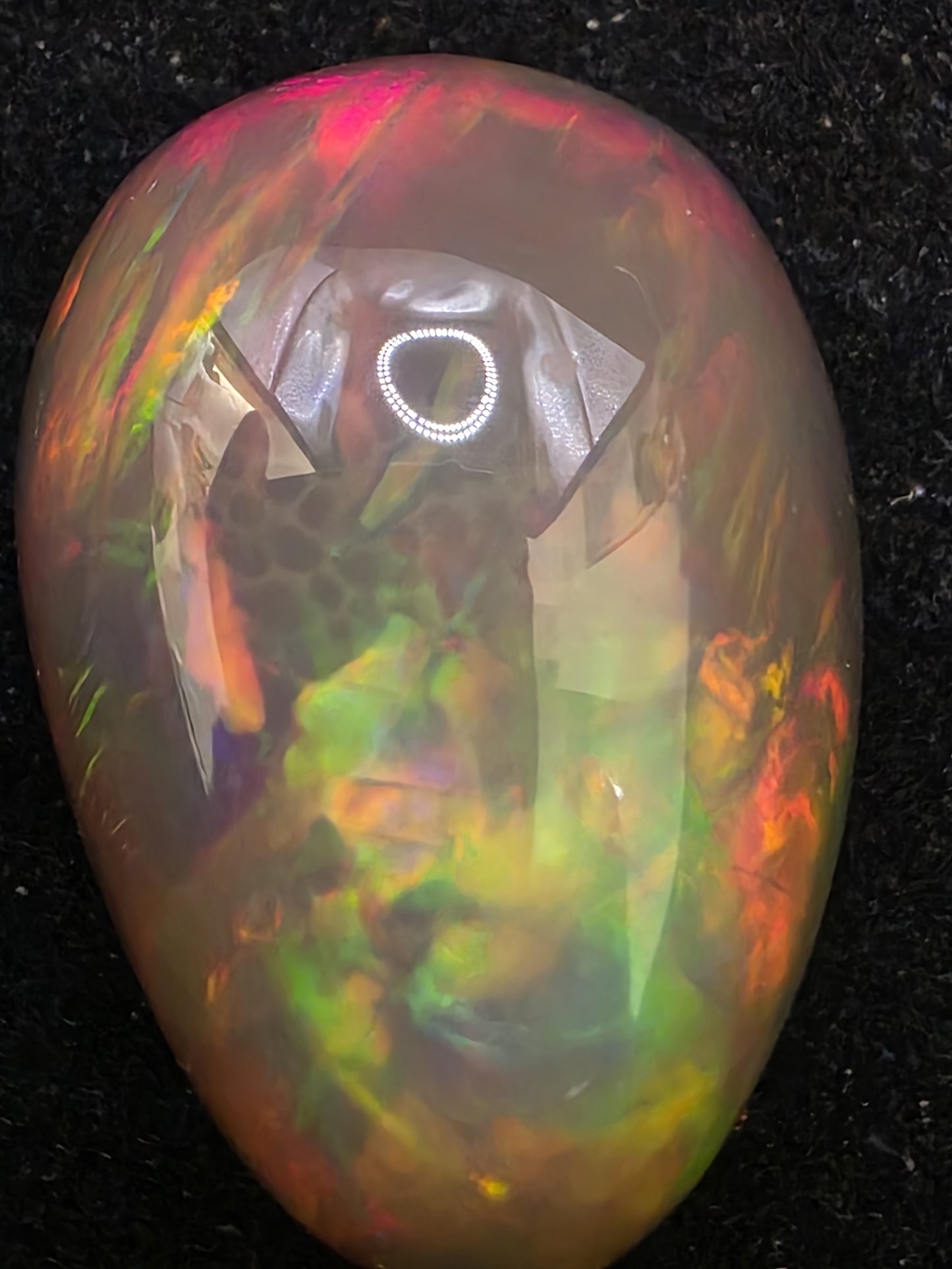 Black Opal special Ethiopian Welo, 18.4 ct pear polished, natural, intense Play-of-Colour