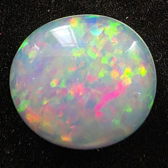 Crystal Opal special Ethiopian Welo, 8.9 ct freeform polished, natural, intense Play-of-Colour