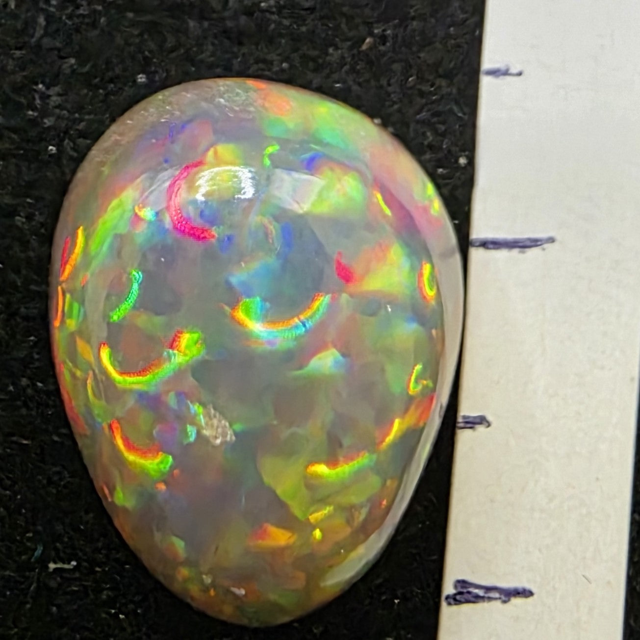Black Opal special Ethiopian Welo, 6.15 ct pear polished, natural, intense Play-of-Colour