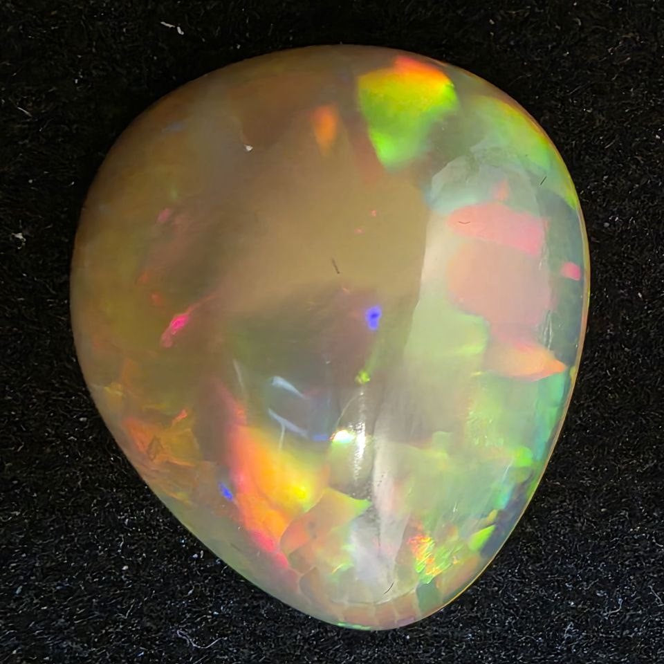 Black Opal special Ethiopian Welo, 12.25 ct pear polished, natural