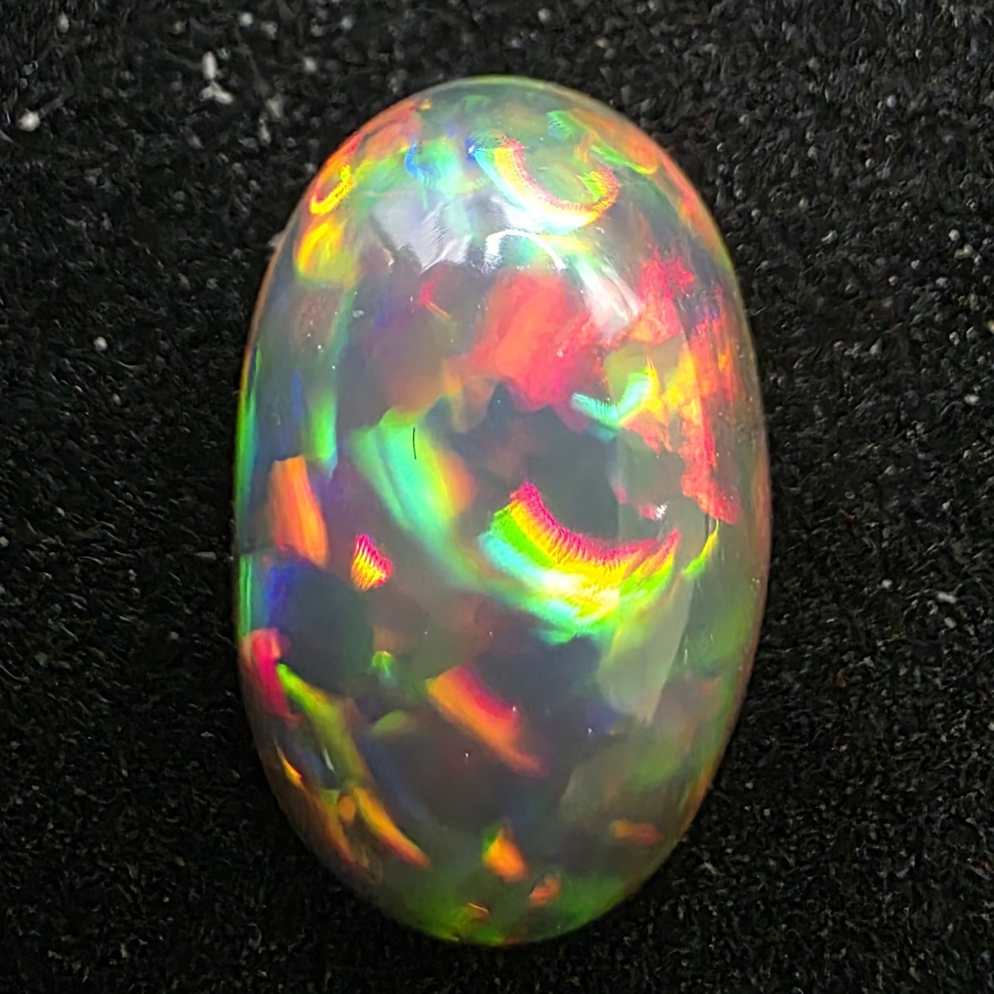 Black Opal special Ethiopian Welo, 2.95 ct oval polished, natural, intense Play-of-Colour