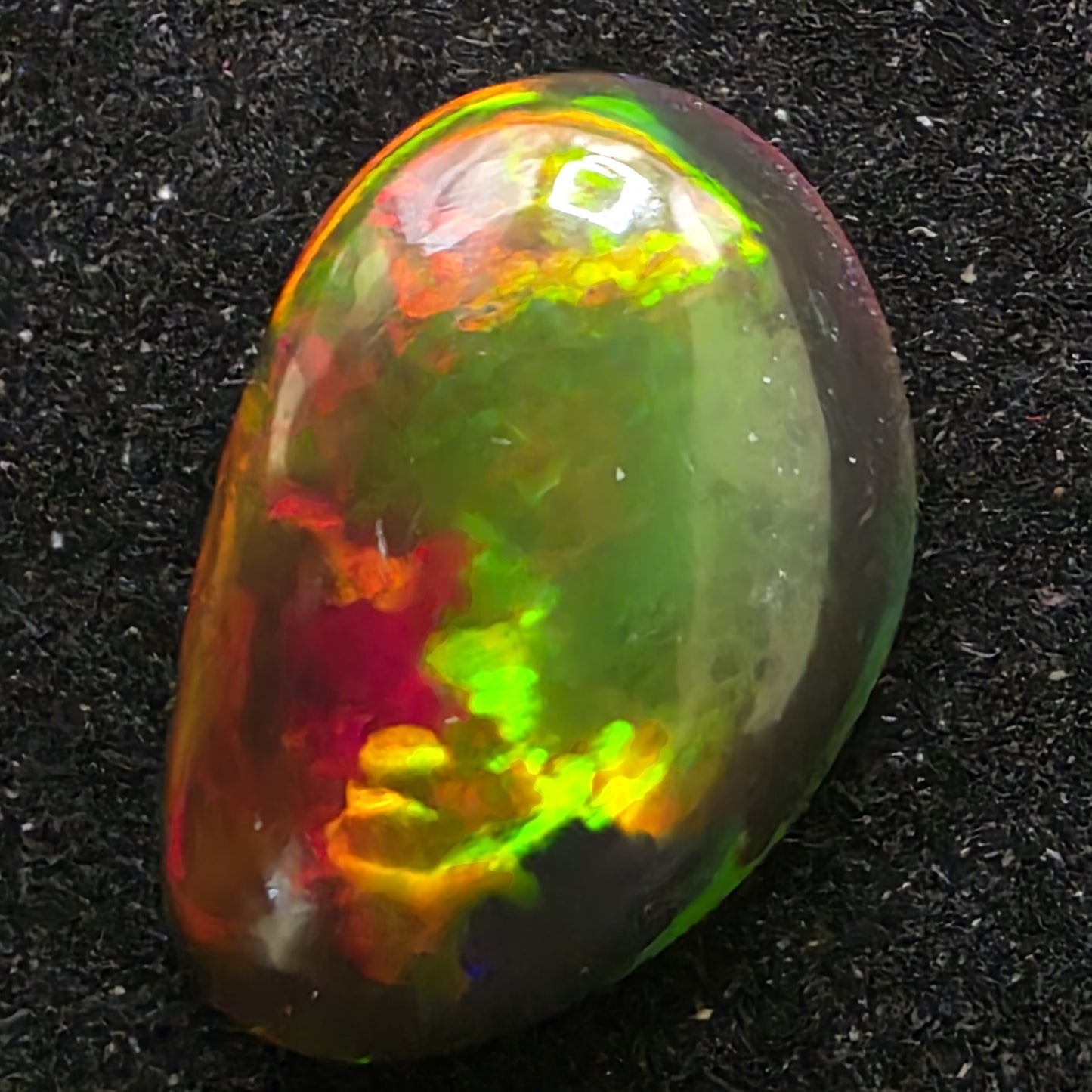 Black Opal special Ethiopian Welo, 5.45 ct freeform polished, natural, intense Play-of-Colour