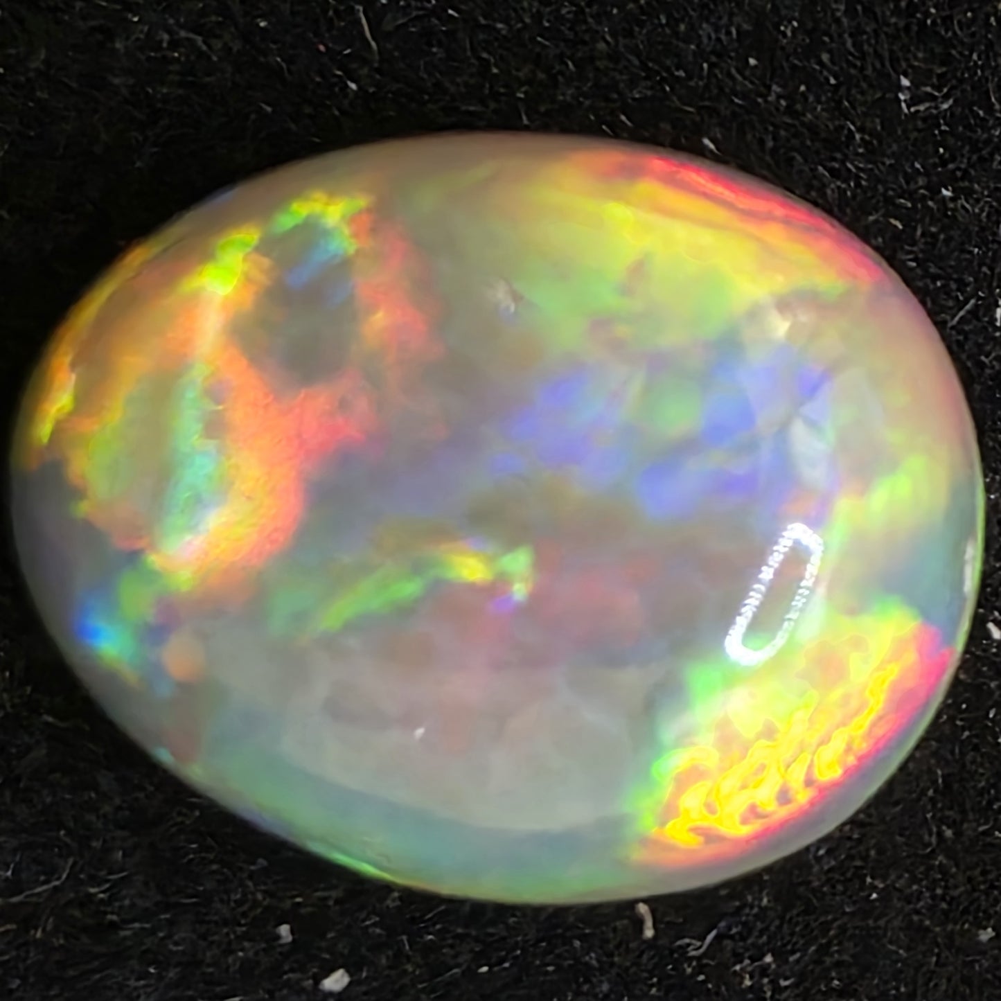 Black Opal special Ethiopian Welo, 7 ct pear polished, natural, intense Play-of-Colour
