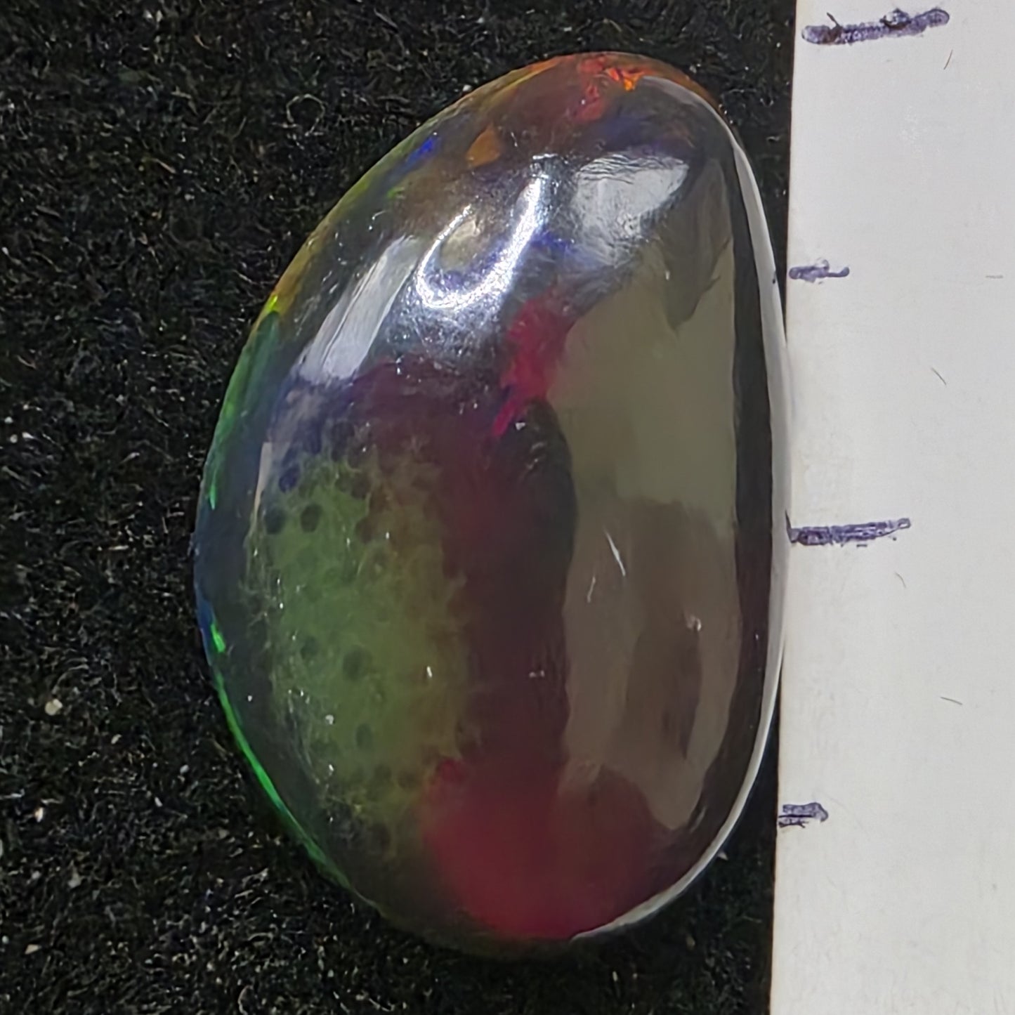 Black Opal special Ethiopian Welo, 5.45 ct freeform polished, natural, intense Play-of-Colour