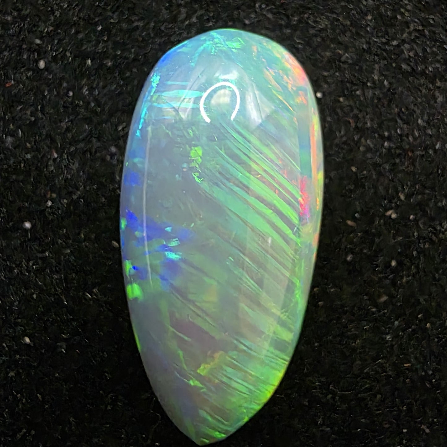Black Opal special Ethiopian Welo, 5 ct pear polished, natural, intense Play-of-Colour