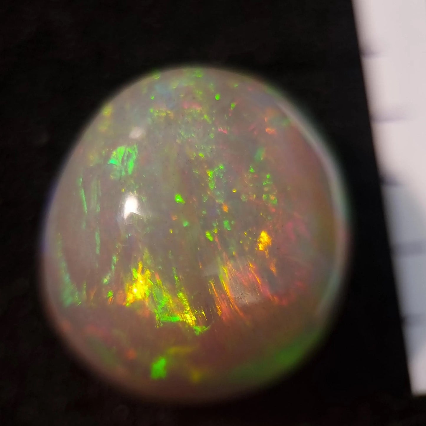 Artsy Black Opal special Ethiopian Welo, 34.2 ct freeform polished, natural