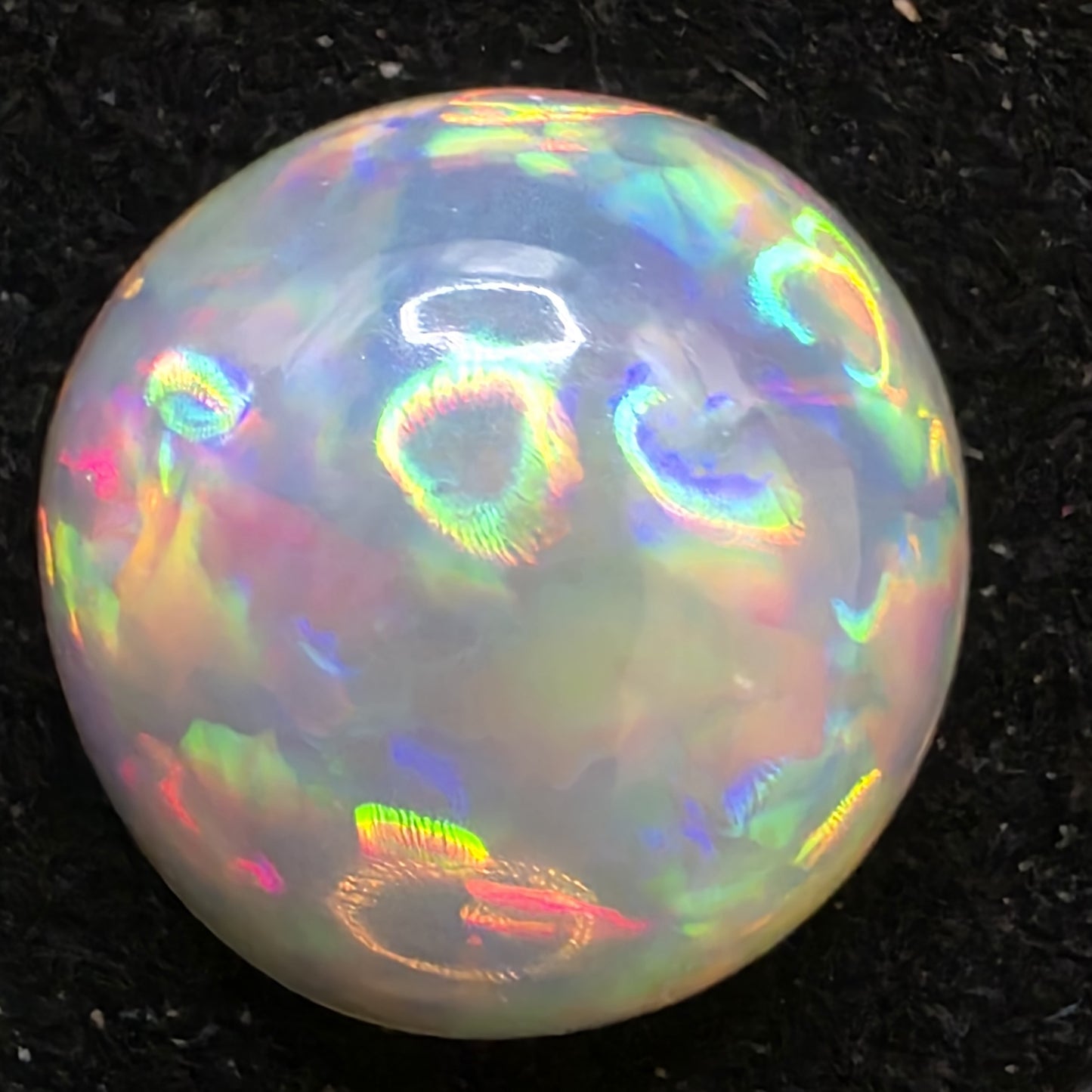 Crystal Opal special Ethiopian Welo, 6.55 ct round polished, natural, intense Play-of-Colour