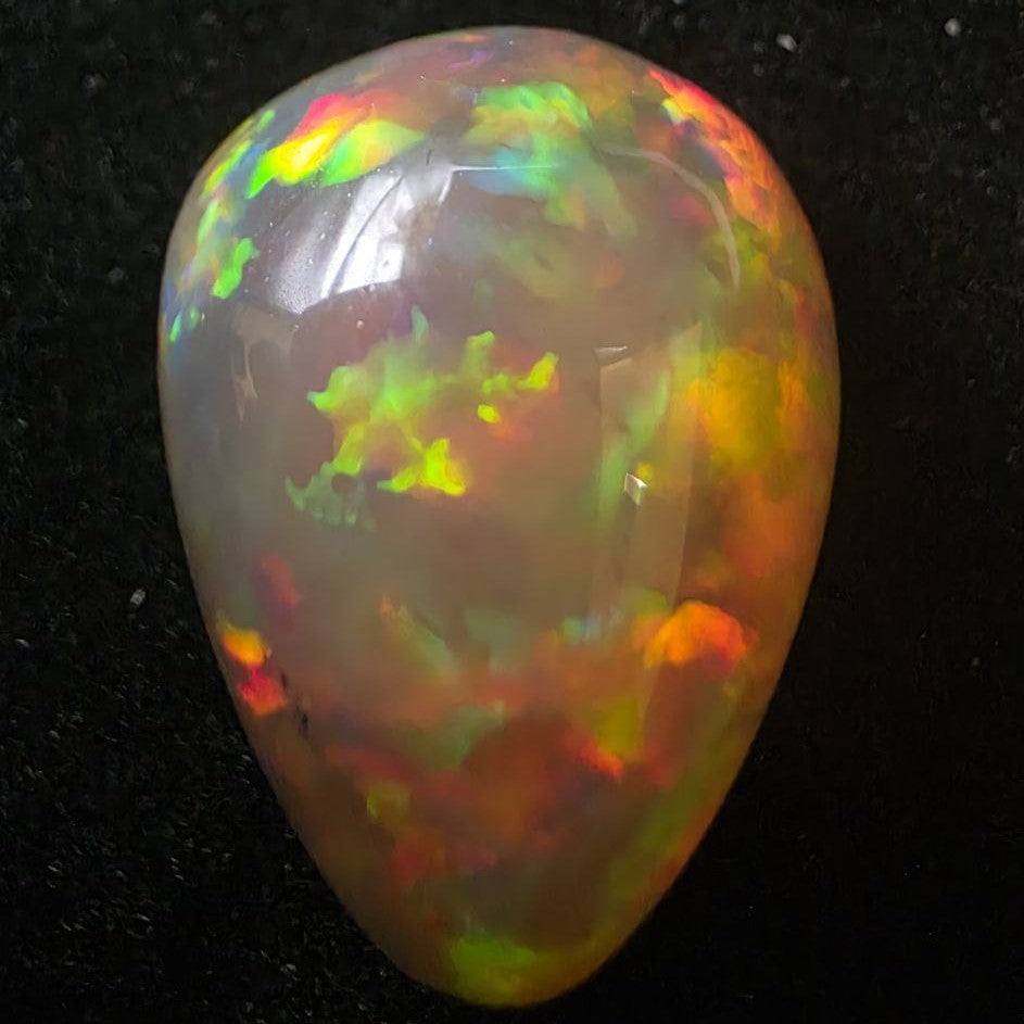 Black Opal special Ethiopian Welo, 23.55 ct pear polished, natural, intense Play-of-Colour