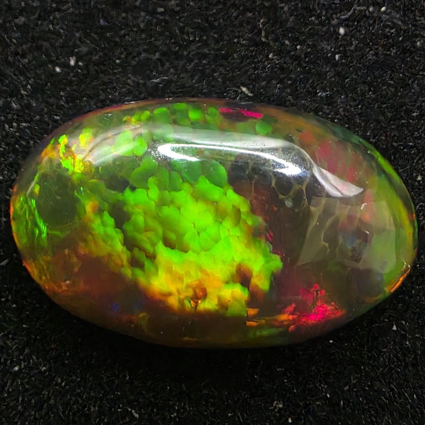 Black Opal special Ethiopian Welo, 3.3 ct oval polished, natural, intense Play-of-Colour