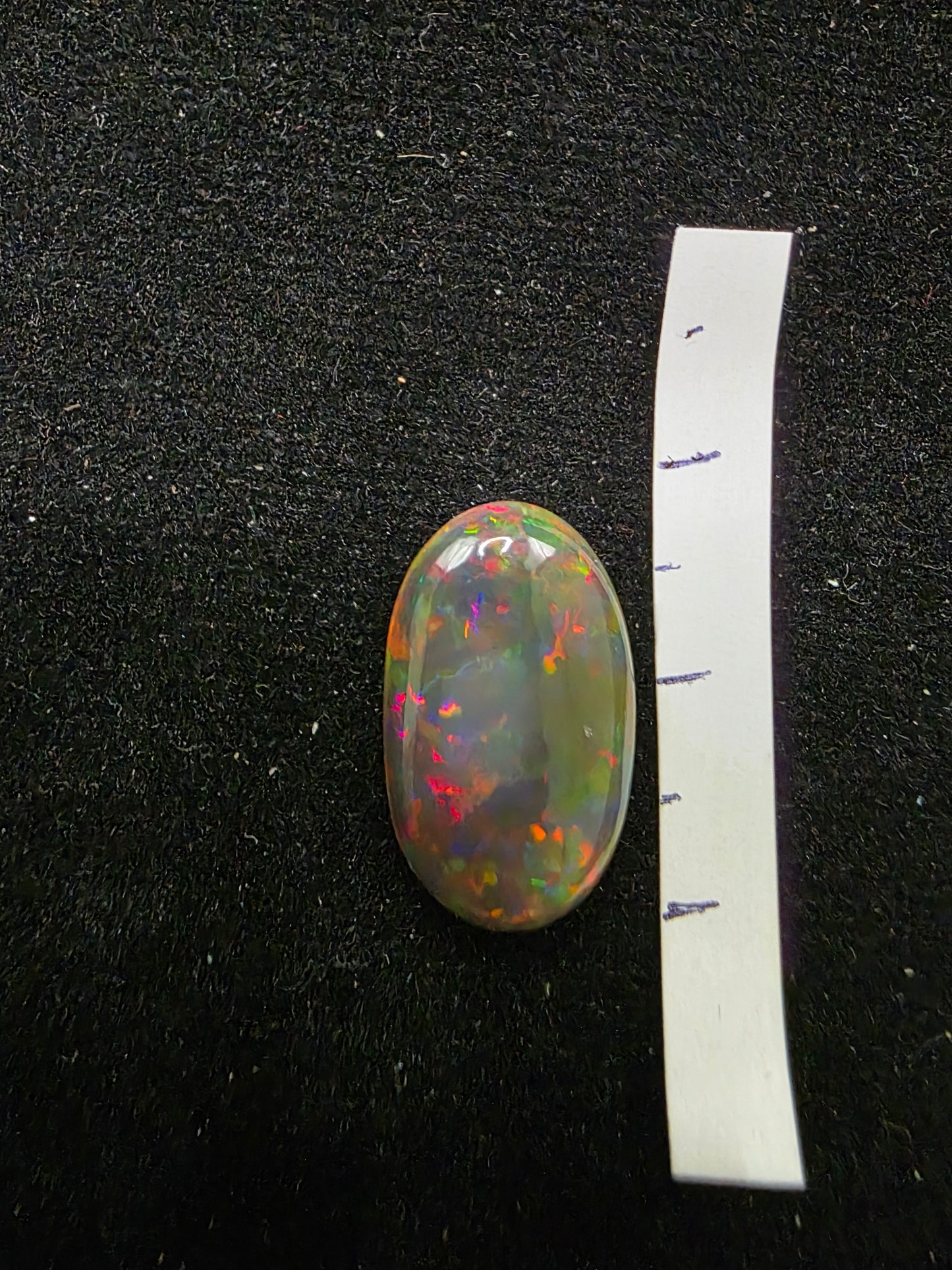 Black Opal special Ethiopian Welo, 4.55 ct oval polished, natural, intense Play-of-Colour
