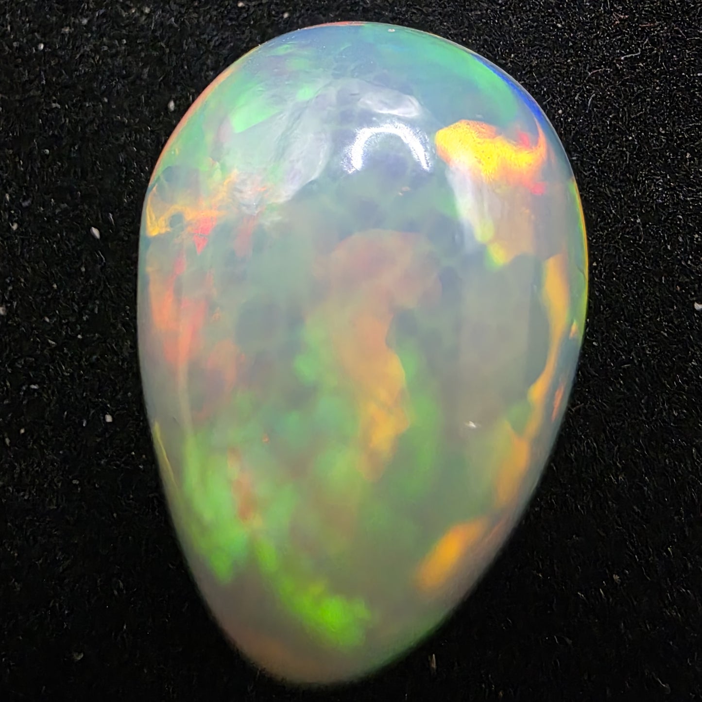 White Opal special Ethiopian Welo, 10.85 ct pear polished, natural, intense Play-of-Colour