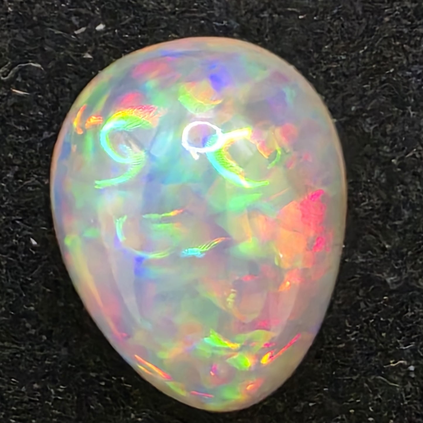 Crystal Opal special Ethiopian Welo, 4.7 ct pear polished, natural, intense Play-of-Colour