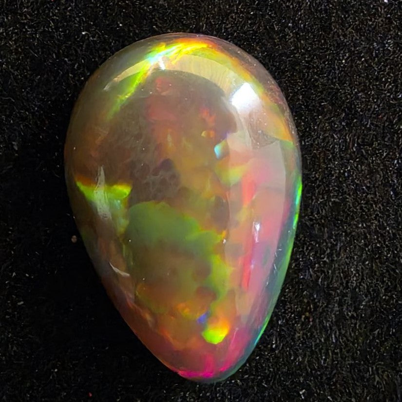 Perfect! Black Opal outstanding Ethiopian Welo, 6.45 ct pear polished, natural, intense Play-of-Colour