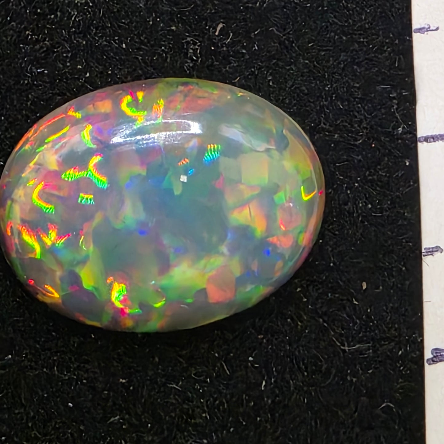 Black Opal special Ethiopian Welo, 3.25 ct oval polished, natural, intense Play-of-Colour