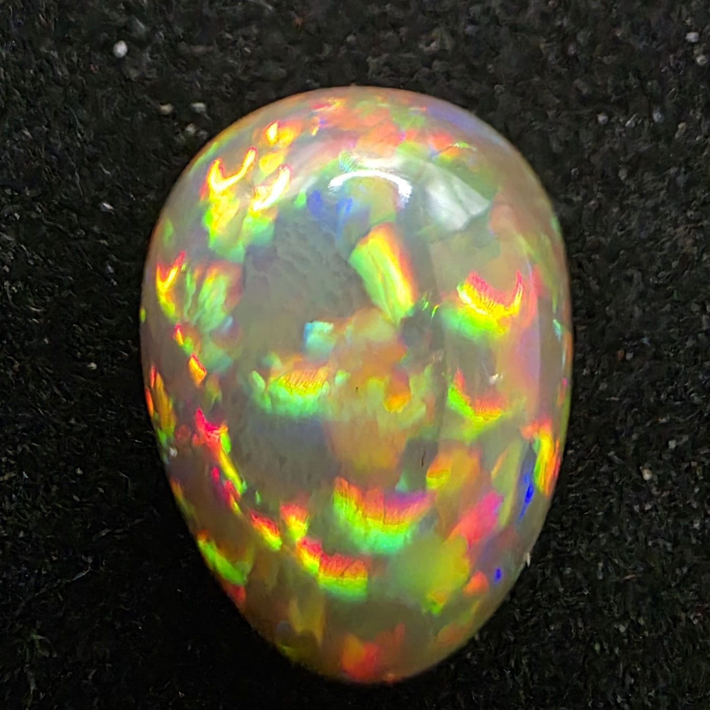 Black Opal special Ethiopian Welo, 5.7 ct pear polished, natural, intense Play-of-Colour