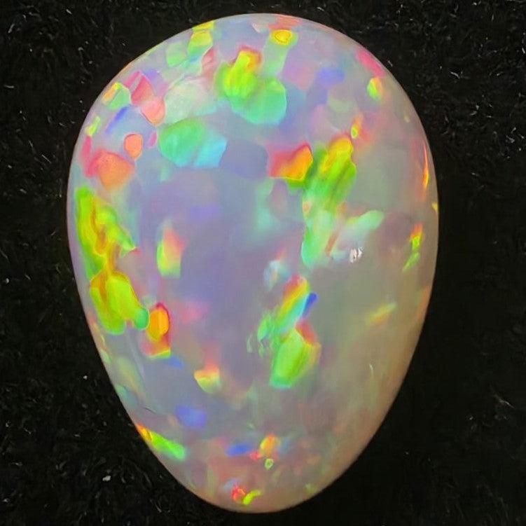 Black Opal special Ethiopian Welo, 4.25 ct pear polished, natural, intense Play-of-Colour