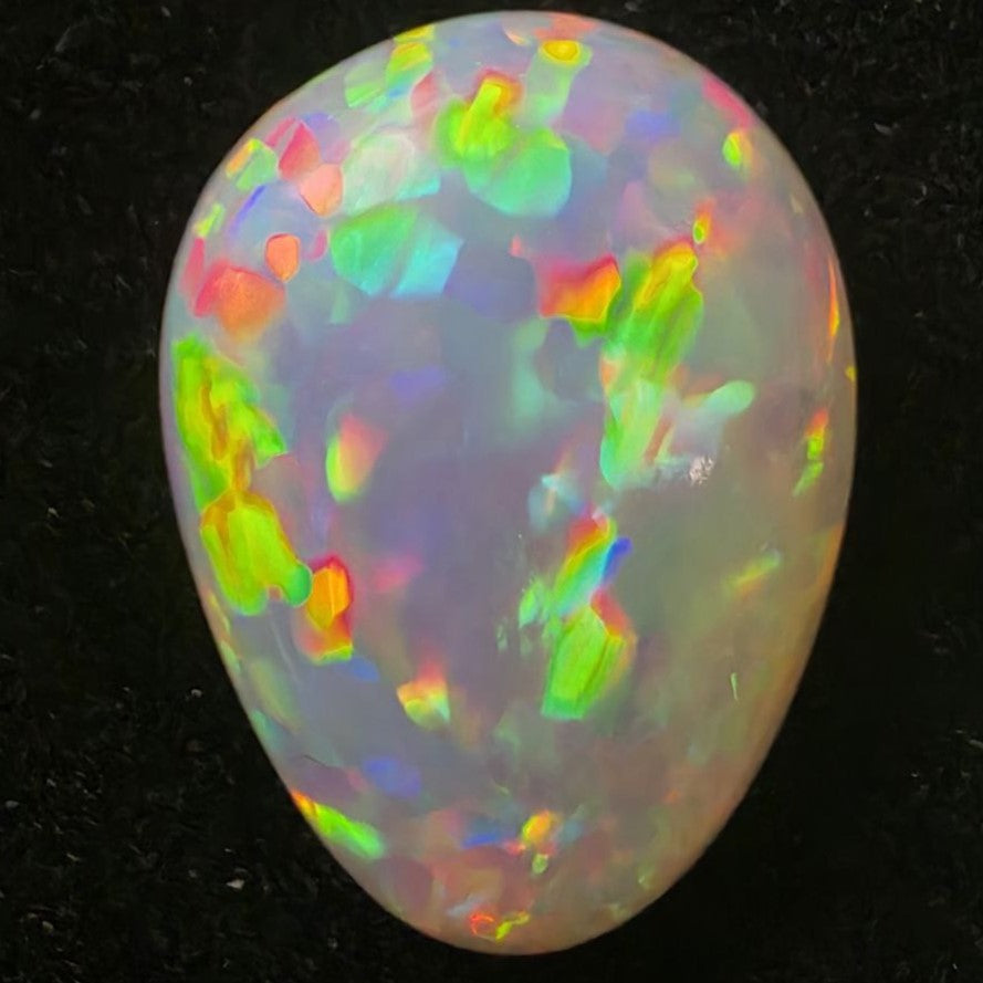 Black Opal special Ethiopian Welo, 4.25 ct pear polished, natural, intense Play-of-Colour
