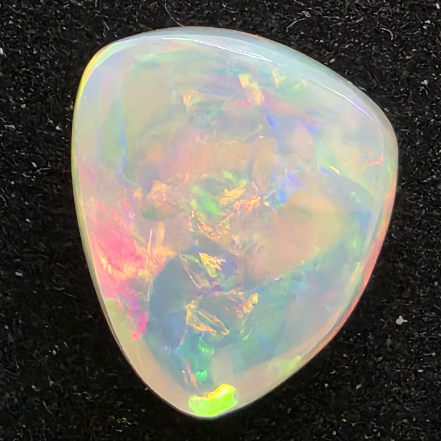 White Opal special Ethiopian Welo, 7.2 ct freeform polished, natural, intense Play-of-Colour