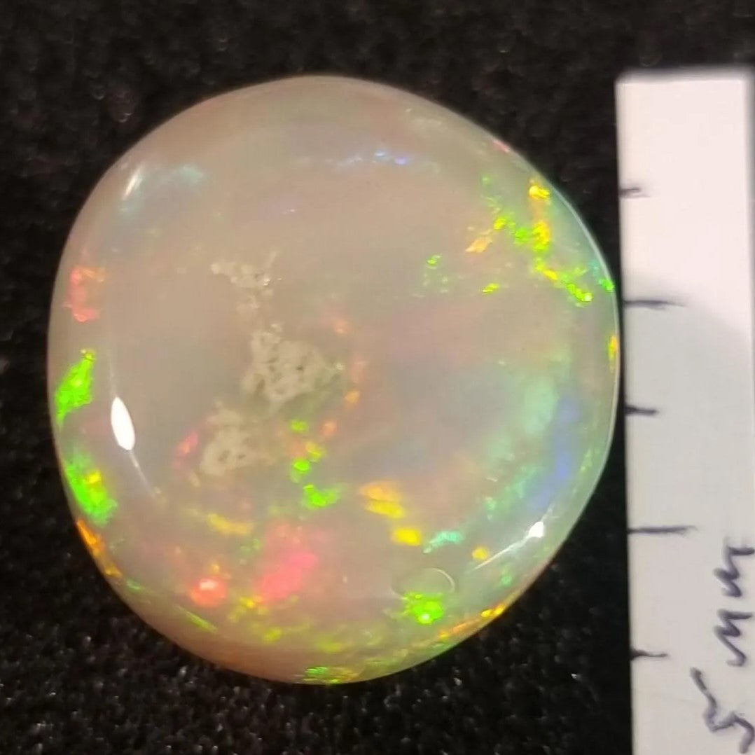 Artsy Black Opal special Ethiopian Welo, 34.2 ct freeform polished, natural