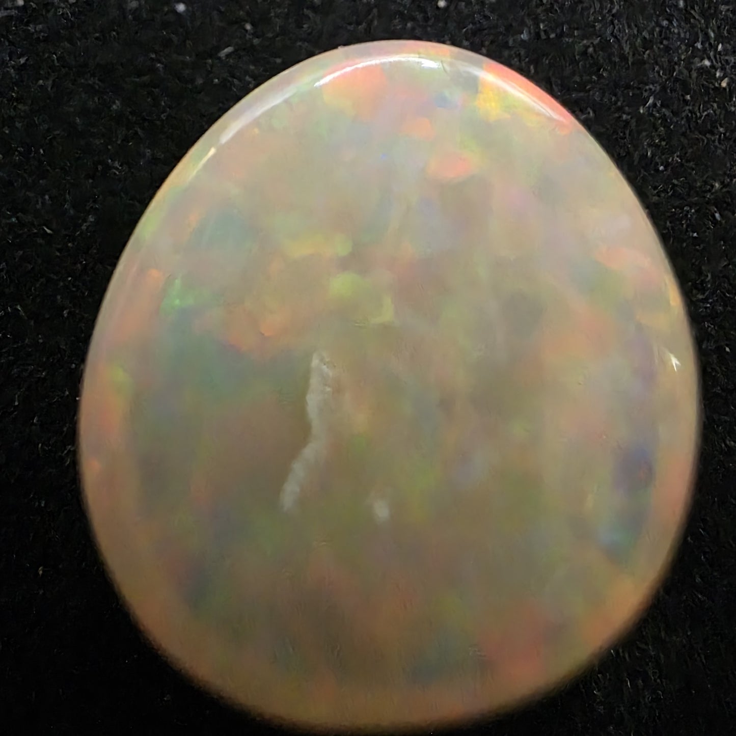 Black Opal special Ethiopian Welo, 5 ct freeform polished, natural, intense Play-of-Colour