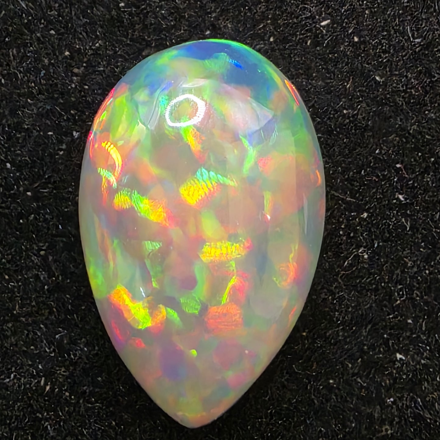 Black Opal special Ethiopian Welo, 6.1 ct pear polished, natural, intense Play-of-Colour
