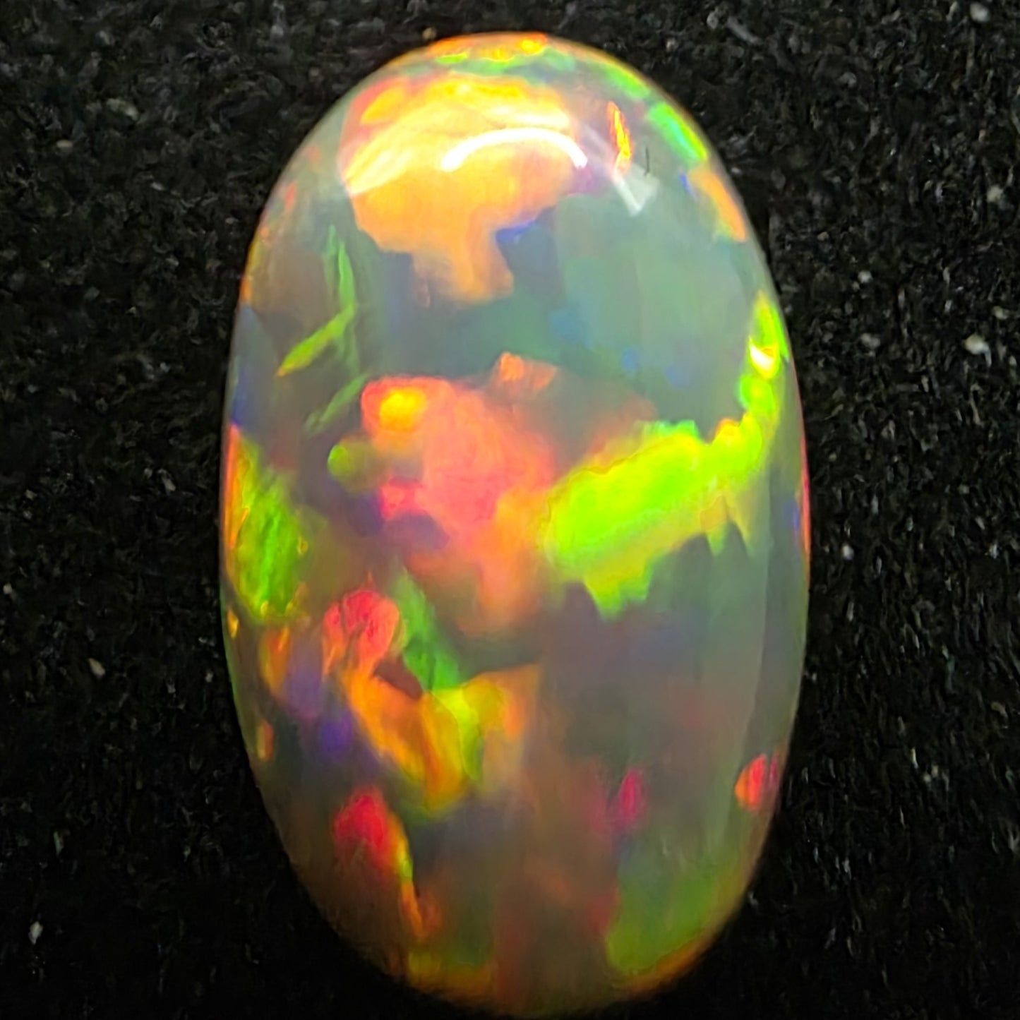Black Opal special Ethiopian Welo, 2.4 ct oval polished, natural, intense Play-of-Colour